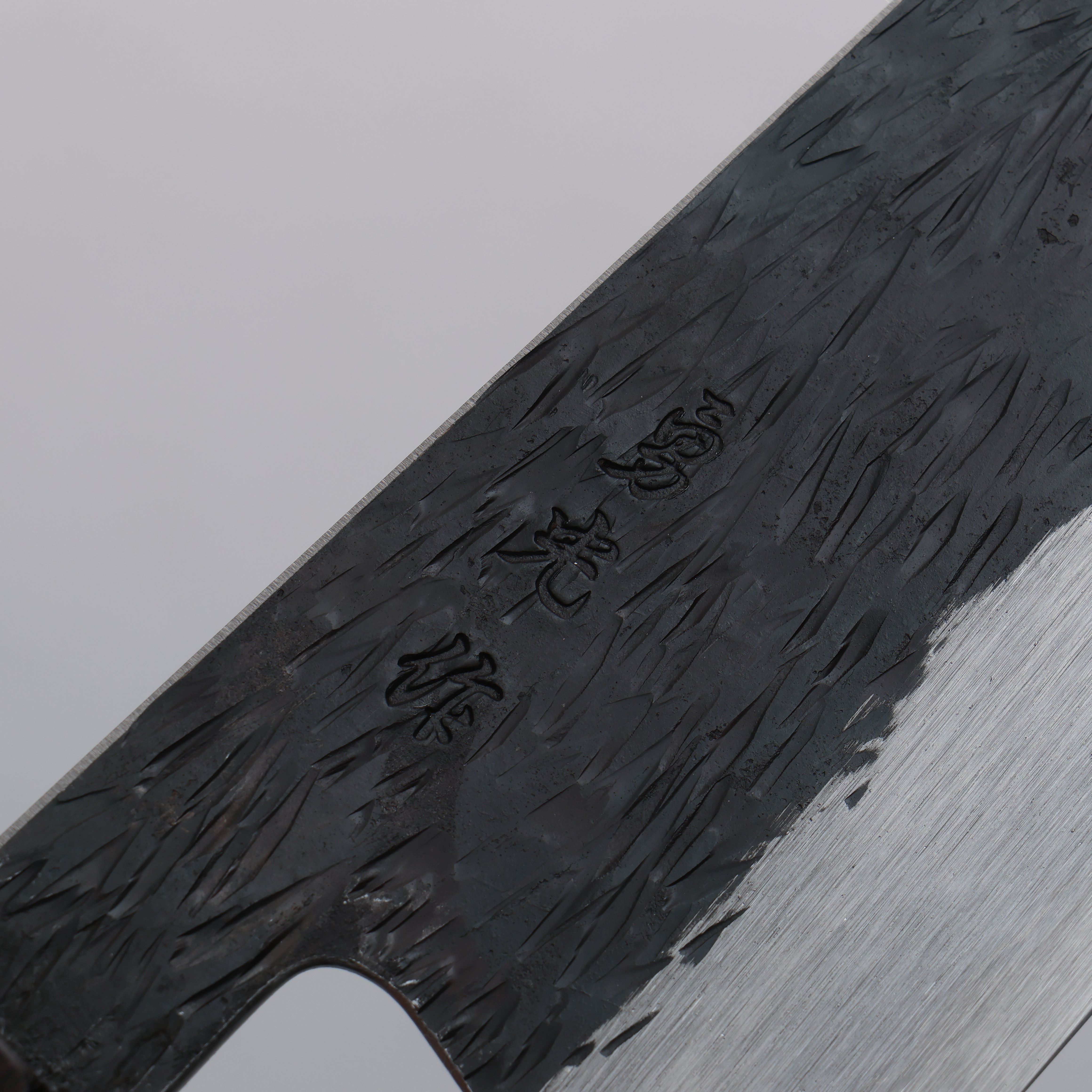 Isamitsu Abe Blue Super Hammered Kurouchi Gyuto 210mm Pentagonal Purple Bombay Black Wood Handle - Seisuke Knife
