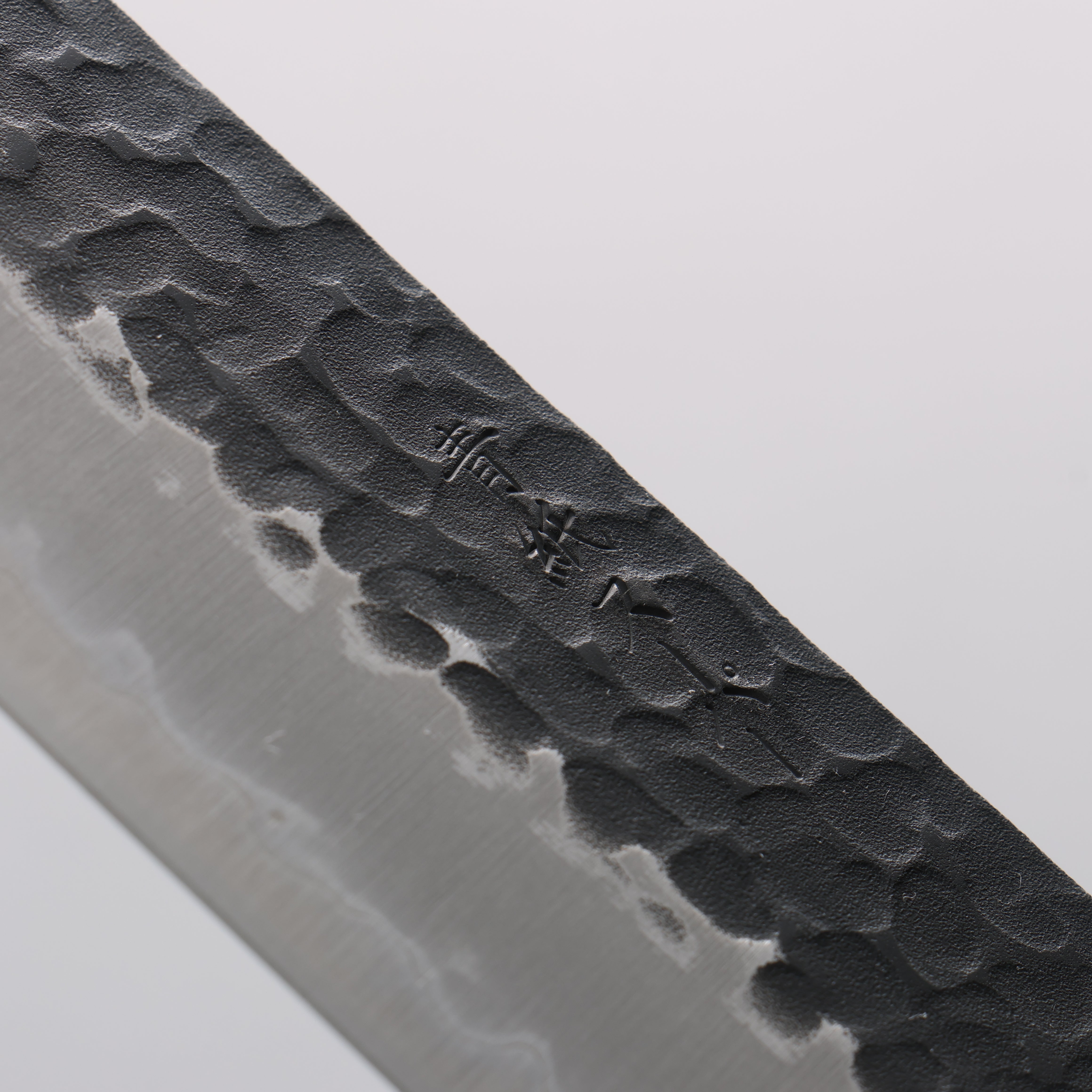 Seisuke Blue Super Hammered Kurouchi Kiritsuke Gyuto 210mm Red Pakka wood Handle - Seisuke Knife